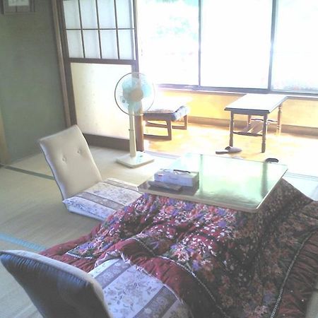 Hôtel Minshuku Yuraku à Aoki Extérieur photo